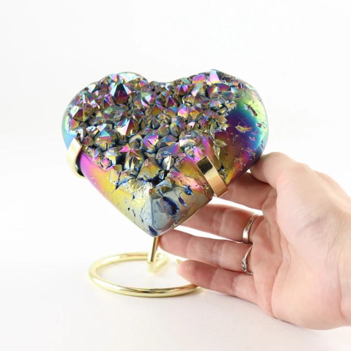 22009-5-titanium-hart-op-gouden-standaard-hand