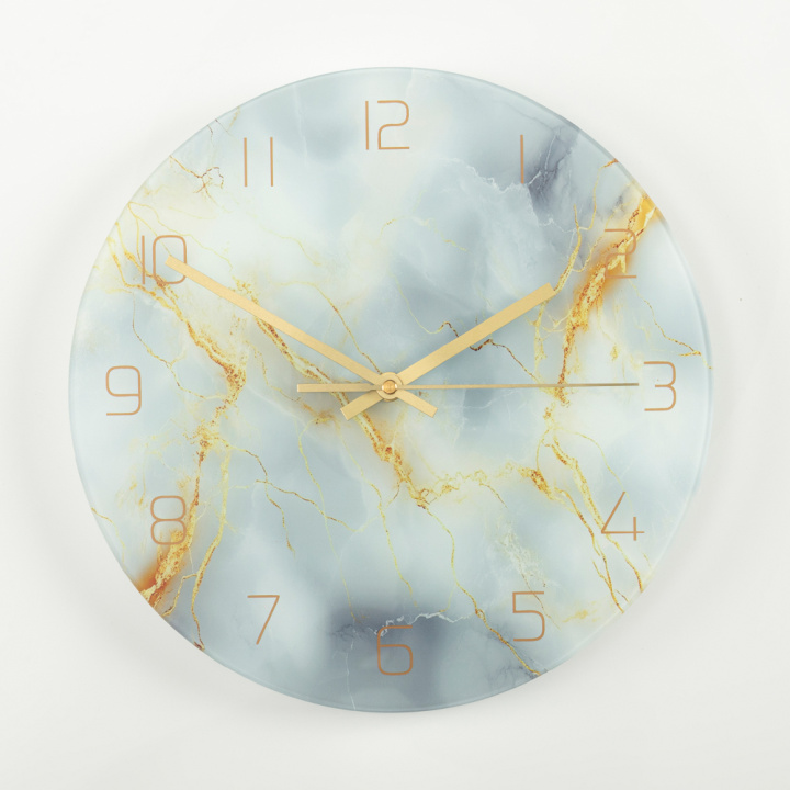 wandklok goud marmer