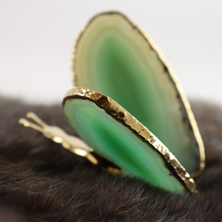 groene agaat vlinder met gouden details