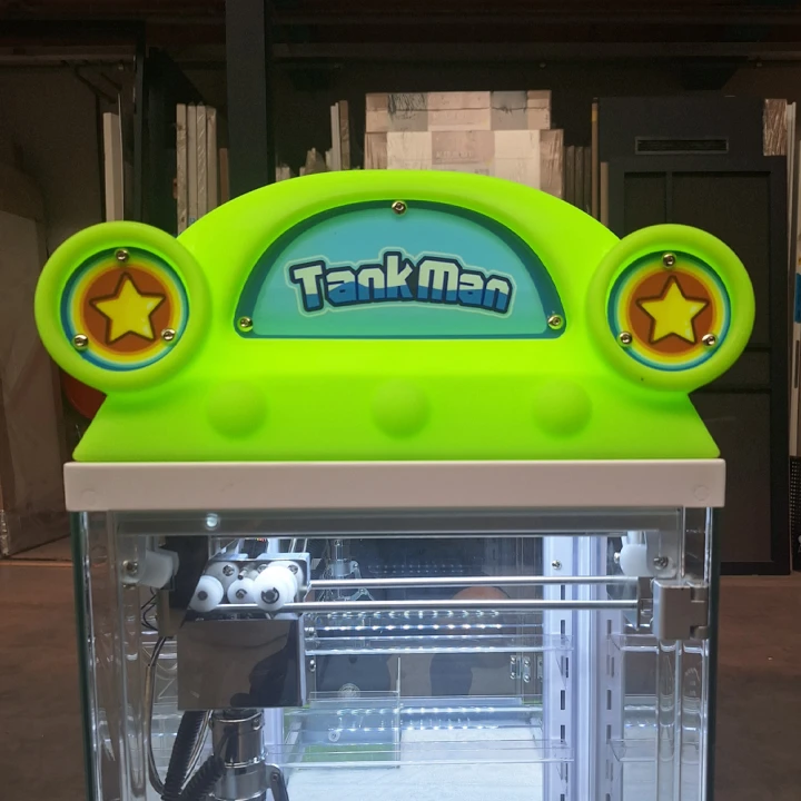 19343 – tank-man-grijpmachine-claw-groen-bovenkant-sfeer-1